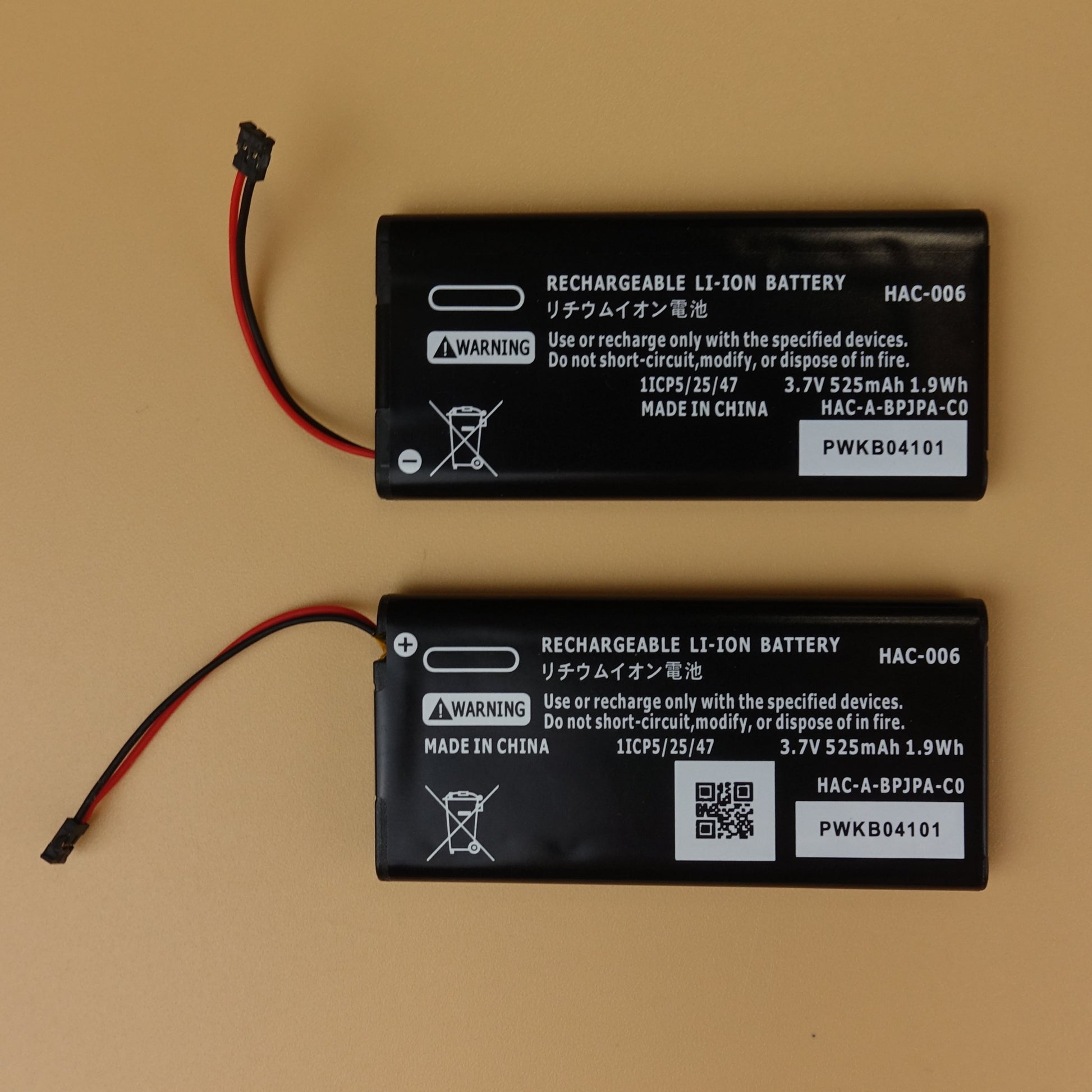 front and back views on a pair of HAC-006 batteries.